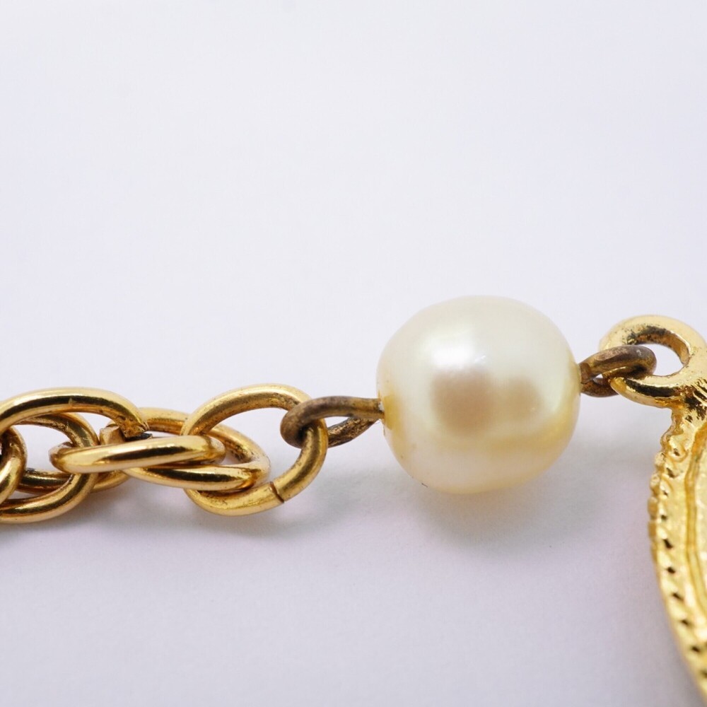 CHANEL Gold Pearl Logo Necklace - Picture 8 of 8